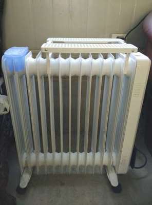 韓國現代(HYUNDAI)DNQ006-13 13片家用電熱油汀取暖器/電暖器/電暖氣--使用效果非常好,就是電源線有點軟,不知道.